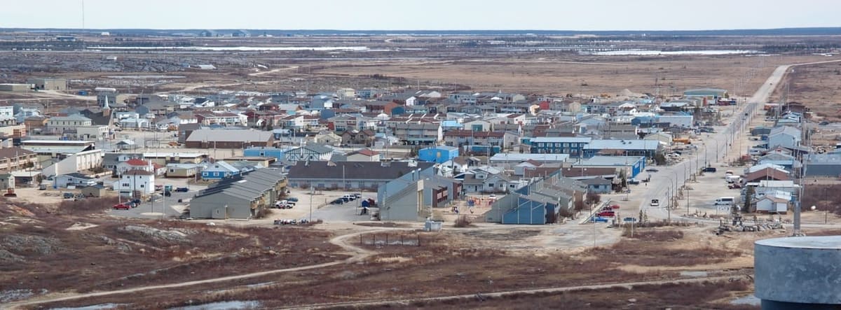 The town of Churchill, Manitoba, on the shore of Hudson Bay under a low northern sky